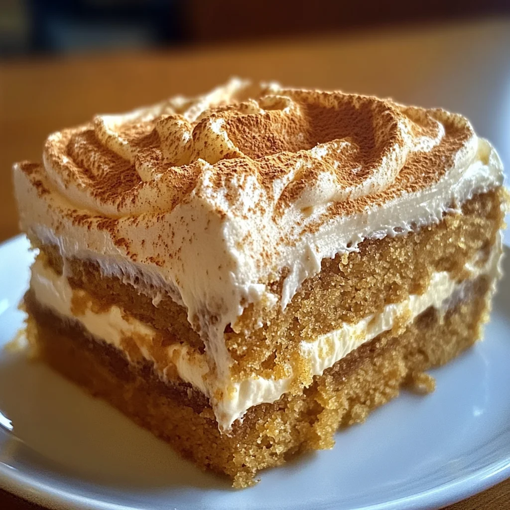 Pumpkin Spice Gooey Cake with Cream Cheese Frosting